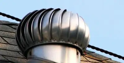 attic fan installation services with professionally installed roof ventilation unit in Houston, TX