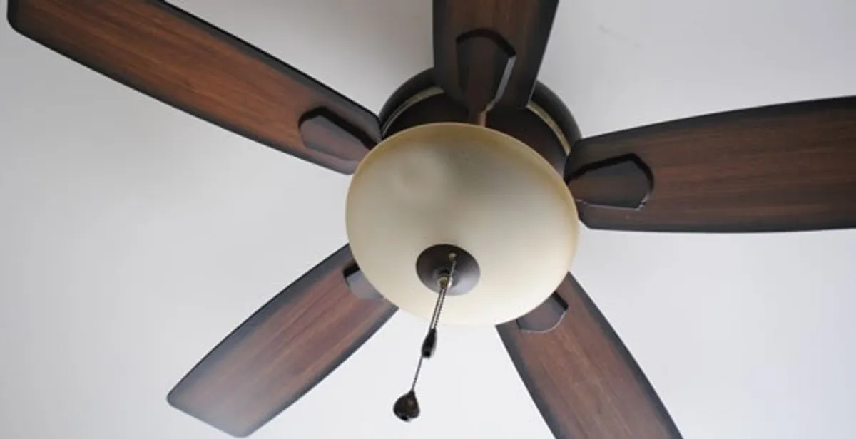 Fully installed ceiling fan with balanced blades and light fixture in Houston, TX