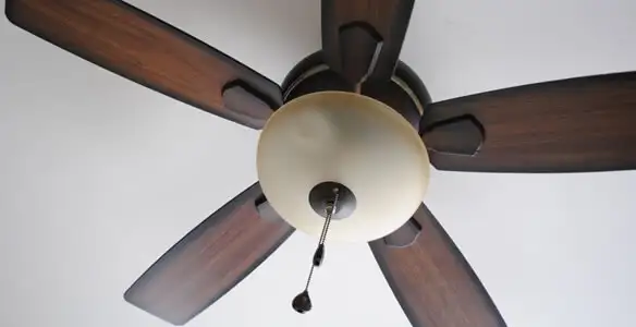 Fully installed ceiling fan with balanced blades and light fixture in Houston, TX