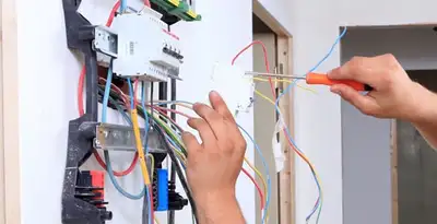 electrician services performing residential electrical panel wiring in Houston, TX