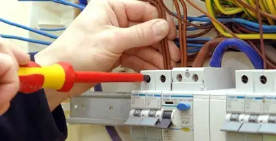 electrician services performing professional electrical panel wiring and connections in Houston, TX