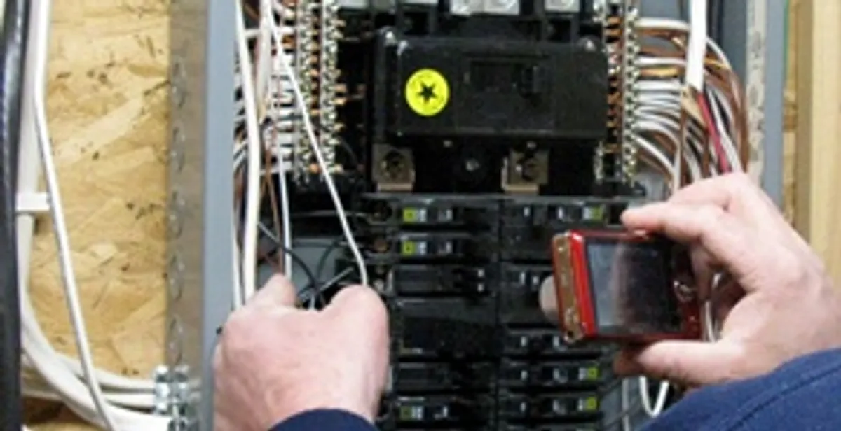 Home electrical inspection of circuit breaker panel by licensed electrician in Houston, TX