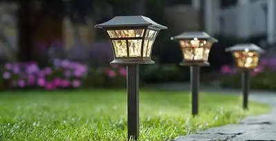 landscape lighting installation services with professionally installed pathway lights in Houston, TX