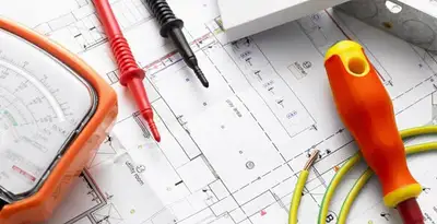 licensed electrician planning and testing electrical systems using professional tools in Houston, TX