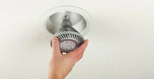lighting installation service featuring recessed ceiling light installed by licensed professionals in Houston, TX