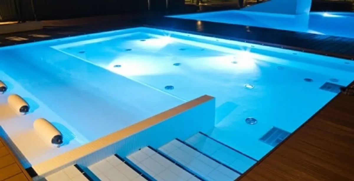 pool light installation and repair services providing modern illuminated pool lighting in Houston, TX
