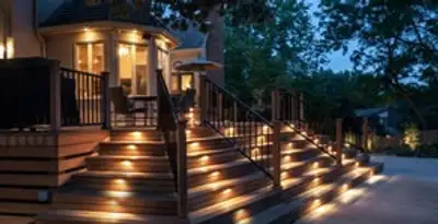 Residential electrician installing outdoor lighting for home safety in Houston, TX