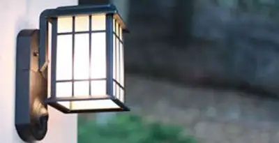 security light installation services with professionally mounted exterior wall light in Houston, TX