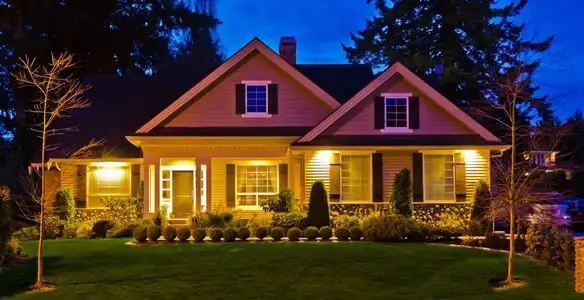 security light installation services illuminating a residential exterior at night in Houston, TX
