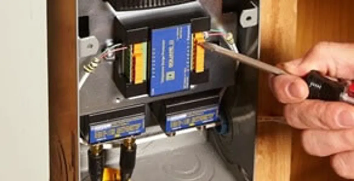 Whole home surge protection device being installed by a licensed electrician to protect electrical systems in Houston, TX